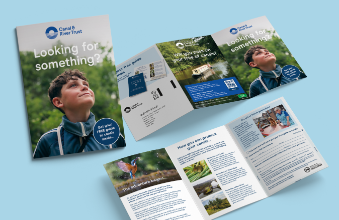 Tri-fold Canal & River Trust brochure set on a blue background, featuring a boy looking up with the text 'Looking for something?'