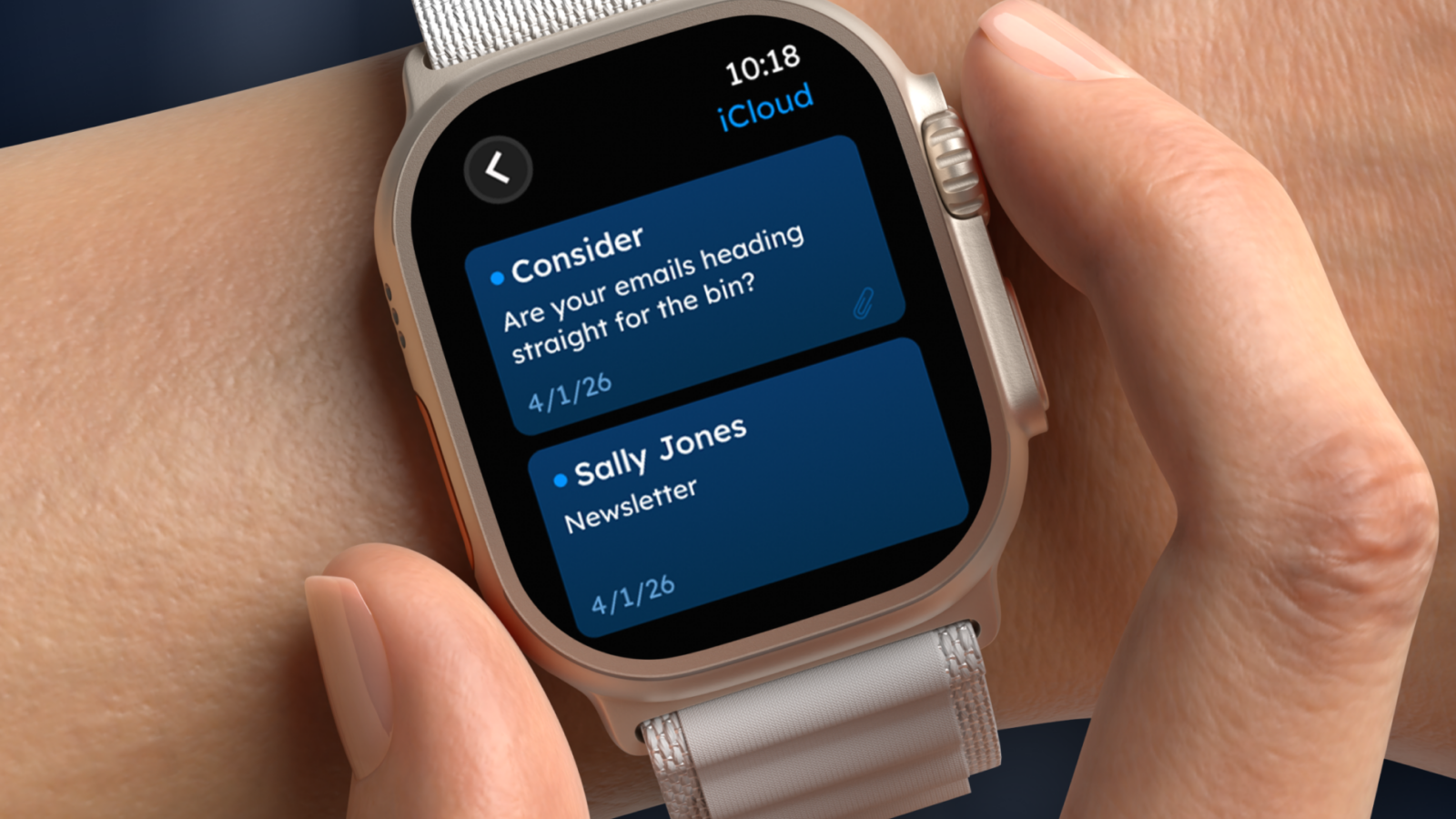 Smartwatch on a wrist displaying blue email previews, including 'Consider — Are your emails heading straight for the bin?' from iCloud.
